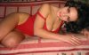 Ukranian sexy brunette woman in red lingerie.jpg